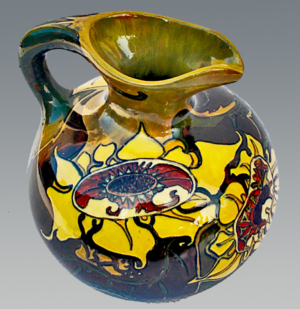 Nr.: 83, On offer decorative pottery made by Rozenburg, Description: Plateel Pitcher, Height 17 cm width 15,5 cm, period: Year 1900, Decorator : unknown, 