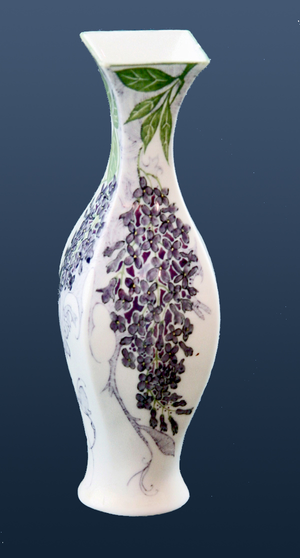 Nr.: 215, Already sold : decorative pottery made by Rozenburg  Plateel (eggshell) little vase, Height 12 cm , Diameter 4 cm , Year 1906 , Decorator Samuel Schellink